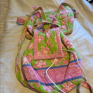 Small bag green with pink flowers and backpack to match.
